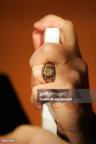 The hand of Murray Costello, who was inducted into the Hockey Hall of Fame, shows off his Hall of Fame ring during the pre-induction photo...