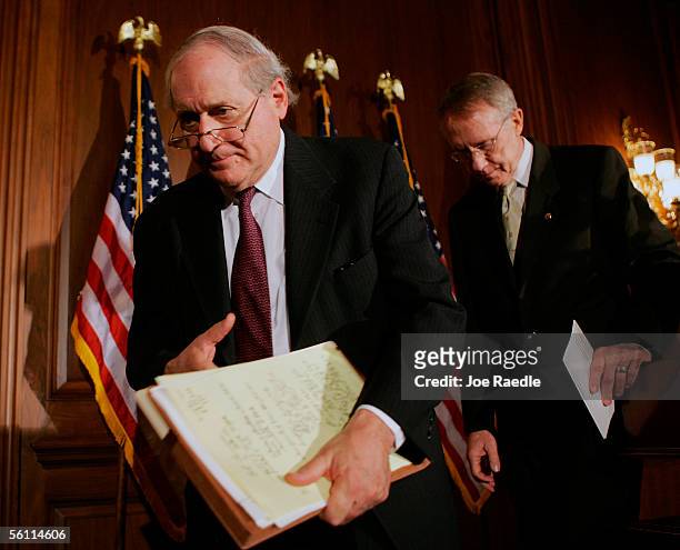 Armed Services Committee Ranking Member Senator Carl Levin and Senate Minority Leader Harry Reid leave after holding a press conference November 7,...