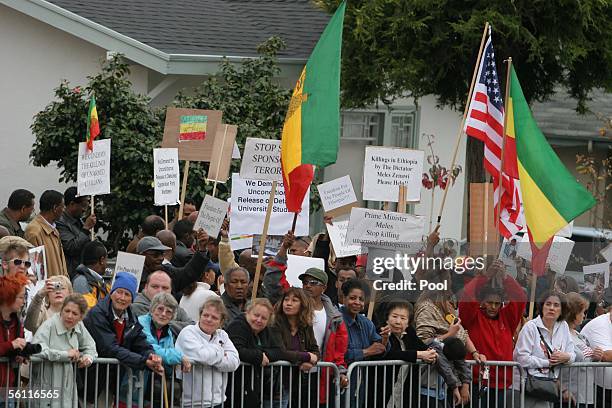 Spectators express their thoughts prior the arrival of Prince Charles, Prince of Wales and his wife, Camilla, Duchess of Cornwall, at Martin Luther...