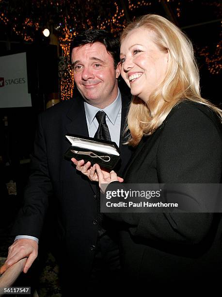 Actor Nathan Lane and Tony Award winning director/choreographer Susan Stroman pose for photographs at the Primary Stages Gala benefit dinner honoring...