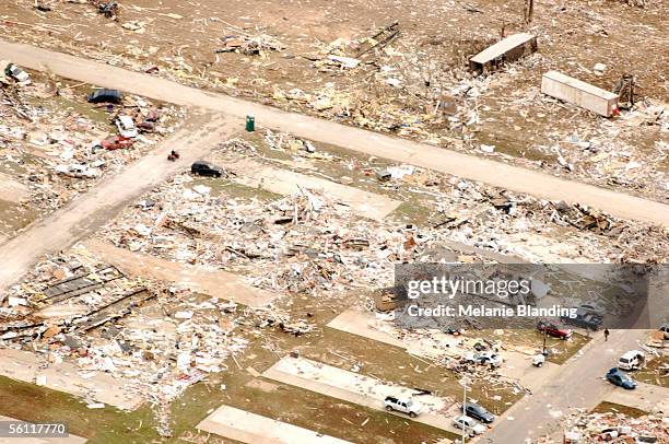 Rubble and debris lie around mobile home lots at the East Brook Mobile Home Park November 7, 2005 in Evansville, Indiana. At least 22 people were...