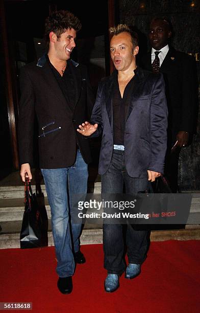 Graham Norton and guest leave the aftershow party following the UK Premiere of "In Her Shoes," at the Grosvenor House Hotel on November 7, 2005 in...