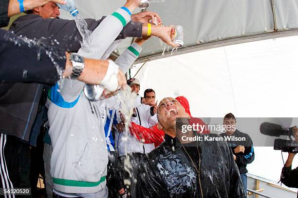 Former six times ASP world champion Kelly Slater celebrates his seventh world title after his closest rival, reigning three times ASP world champion...