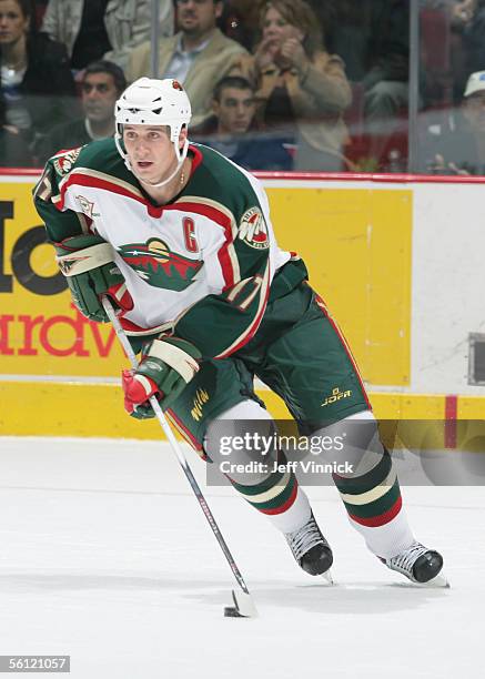 Filip Kuba of the Minnesota Wild skates with the puck during the game against the Vancouver Canucks at General Motors Place on November 2, 2005 in...