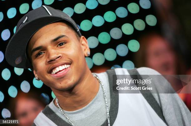 Rapper Chris Brown appears onstage during MTV's Total Request Live at the MTV Times Square Studios on November 8, 2005 in New York City.