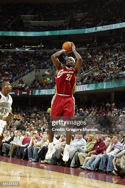 LeBron James of the Cleveland Cavaliers attempts a shot against the New Orleans/Oklahoma City Hornets November 2, 2005 at the Quicken Loans Arena in...
