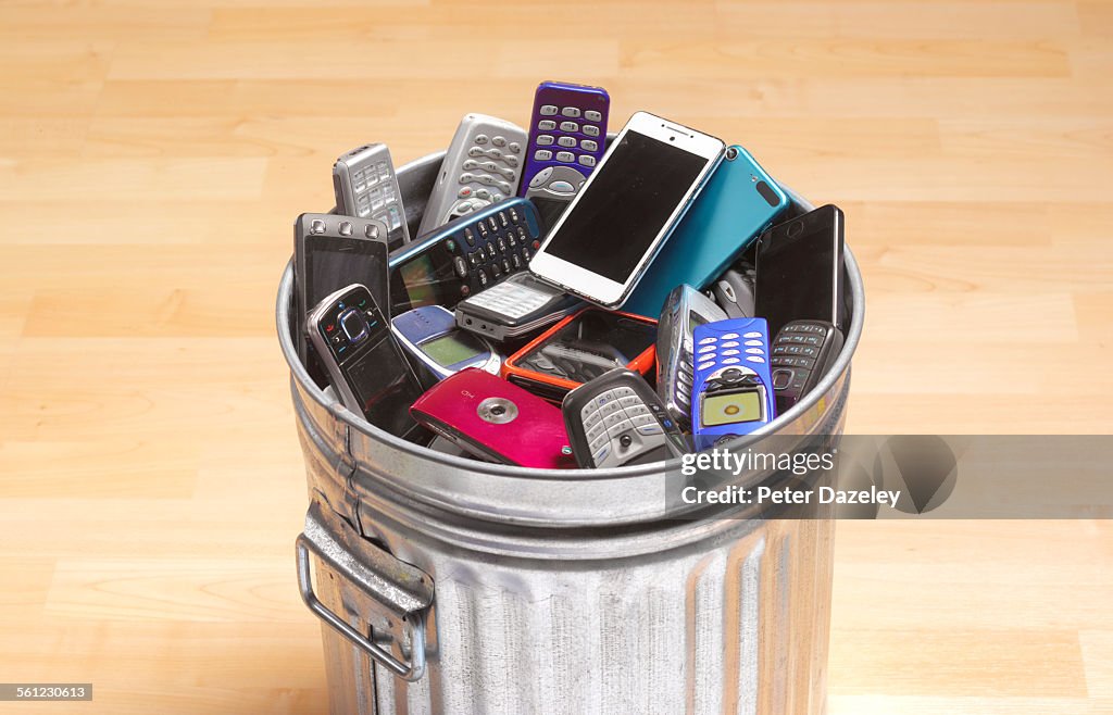 Phones and smart phones in dustbin