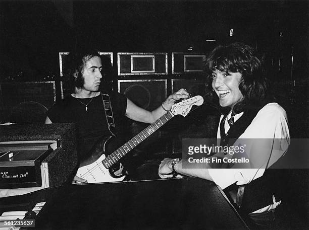 Guitarist Ritchie Blackmore and bassist Bob Daisley, of British rock group Rainbow, 1977.