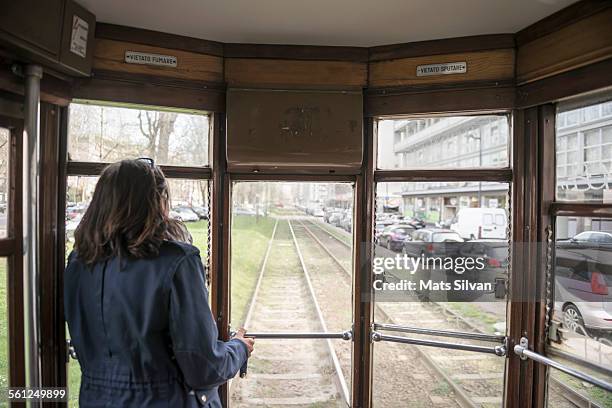 woman travel in a tram - milan tram stock pictures, royalty-free photos & images