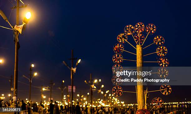 windmills at kumbh mela - allahabad stock pictures, royalty-free photos & images