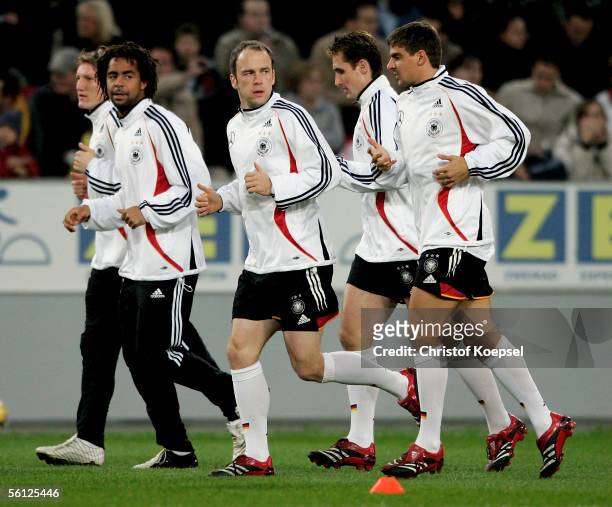 Bastian Schweinsteiger, Patrick Owomoyela, Fabian Ernst, Miroslav Klose and Sebastian Deisler run during the training session of the German Football...