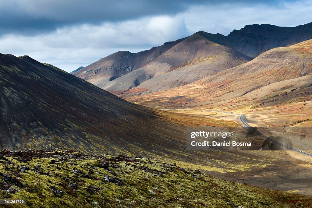 Winding road through volcanic landscape, Iceland