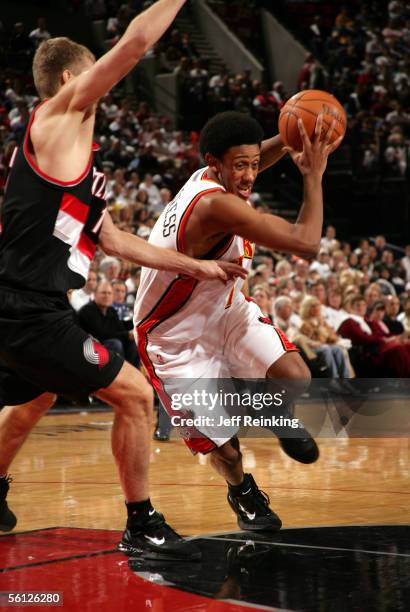 Josh Childress of the Atlanta Hawks drives on Sergei Monia of the Portland Trail Blazers on November 5, 2005 at the Rose Garden Arena in Portland,...