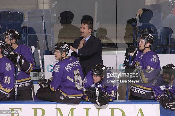 Head coach Jim Hughes of the Manchester Monarchs signals for a penalty against the Bridgeport Sound Tigers at the Arena at Harbor Yard on November 4,...