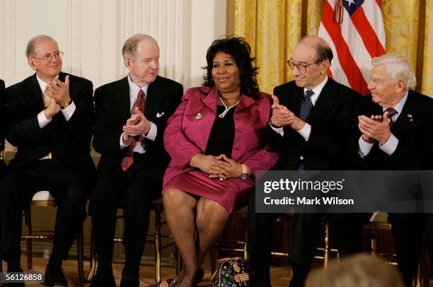 Singer Aretha Franklin recieves applause from internet software designer Robert Kahn historian Robert Conquest , outgoing Federal Reserve Board...