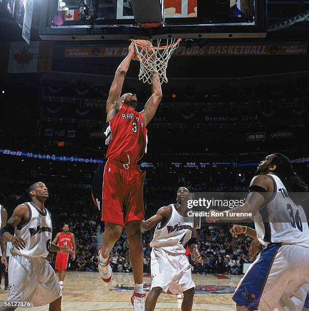 Loren Woods of the Toronto Raptors reaches for the basket against the Washington Wizards at Air Canada Centre on November 2, 2005 in Toronto,...