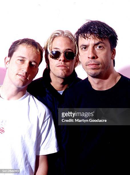 Foo Fighters, group portrait, London, United Kingdom, 1997. L-R Chris Shiflett, Taylor Hawkins and Dave Grohl.