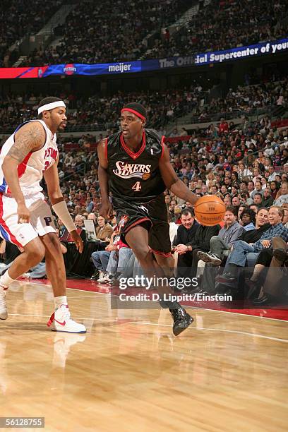 Chris Webber of the Philadelphia 76ers drives to the basket around Rasheed Wallace of the Detroit Pistons during the game at The Palace of Auburn...