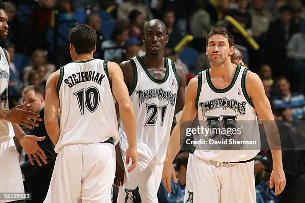 Wally Szczerbiak, Kevin Garnett and Marko Jaric of the Minnesota Timberwolves are seen on court against the Portland Trail Blazers November 2, 2005...