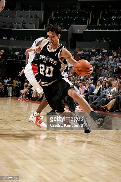 Manu Ginobili of the San Antonio Spurs loops around and heads toward the paint during the game against the Charlotte Bobcats on November 9, 2005 at...