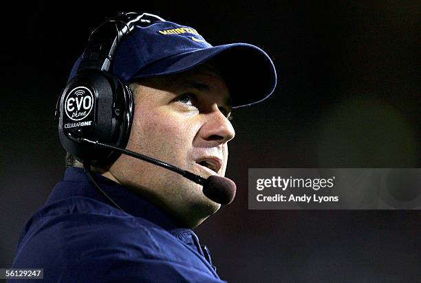 Rich Rodriguez the Head Coach of West Virginia Mountaineers looks on during the game against Cincinnati Bearcats at Nippert Stadium on November 9,...