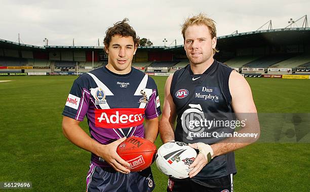 Billy Slater of the Melbourne Storm and Nick Stevens of Carlton pose after the media announcement that Melbourne Storm will share Optus Oval with...