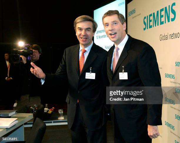 Klaus Kleinfeld, CEO of Siemens, and Heinz-Joachim Neubuerger, member of the board, attend the annual press conference of Siemens on November 10,...