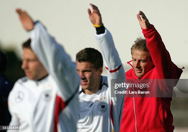 Coach Juergen Klinsmann is seen during a warm up program with his team during the training session of the German National Football Team at the...