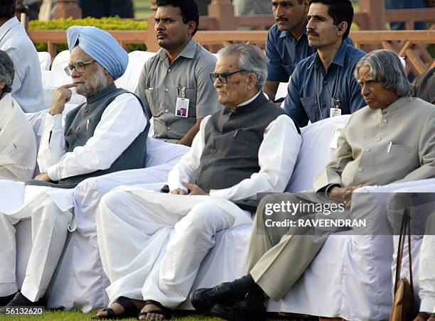 Indian Prime Minister Manmohan Singh , Vice-President Bhairo Singh Shekhawat and Indian President Abdul Kalam attend the funeral ceremony of former...