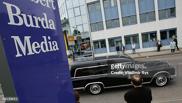 Funeral procession containing the body of Aenne Burda passes the Burda publishing house after the funeral service on November 10, 2005 in Offenburg,...