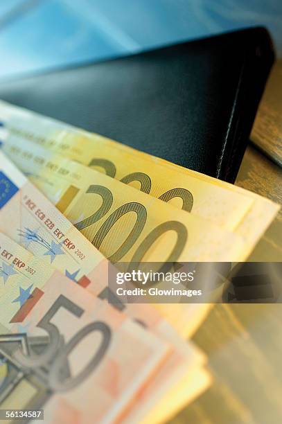 close-up of euro banknotes - two hundred euro banknote stock pictures, royalty-free photos & images