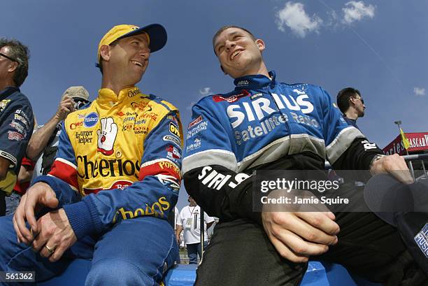 John Andretti, driver of the Petty Enterprises Cherios Dodge Intrepid R/T, and Casey Atwood, driver of the Ultra Motorsports Dodge Intrepid R/T, chat...