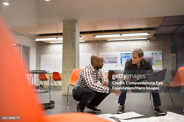 businessmen having meeting in office - designer meeting stock pictures, royalty-free photos & images