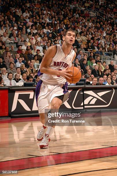 Jose Calderon of the Toronto Raptors drives to the basket during the game against the New Jersey Nets at Air Canada Centre on November 4, 2005 in...