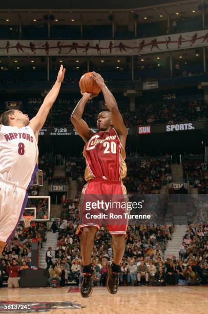 Eric Snow of the Cleveland Cavaliers shoots over Jose Calderon of the Toronto Raptors during the game at Air Canada Centre on November 7, 2005 in...