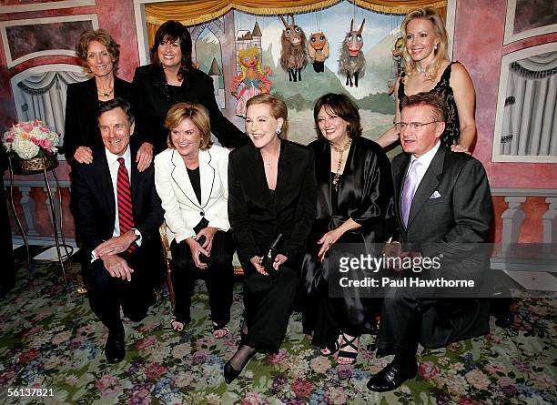 Actress Julie Andrews poses for a photo with the cast from Charmain Carr, Debbie Turner and Kym Karath in back row, front row are Nicholas Hammond,...