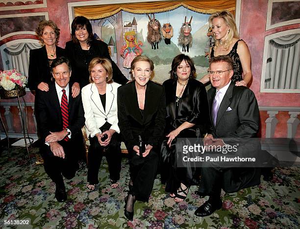 Actress Julie Andrews poses for a photo with the cast from Charmain Carr, Debbie Turner and Kym Karath in back row, front row are Nicholas Hammond,...