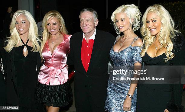 Hugh Hefner and the Playboy Playmates attend the unveiling of the Marilyn Monroe Exhibit at the Queen Mary on November 10, 2005 in Long Beach,...
