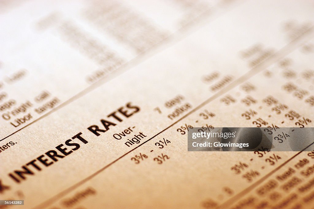"Paper with interest rates, close-up"