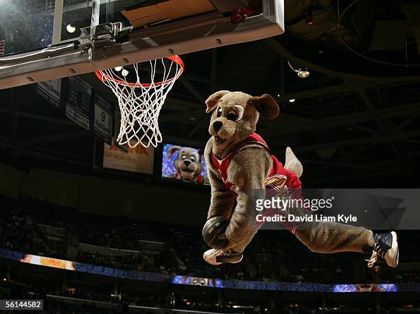 Cleveland Cavaliers mascot Moondog goes up for a powerdunk during a break in the game against the Memphis Grizzlies at Quicken Loans Arena on...