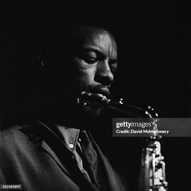 American jazz saxophonist, trumpeter and composer, Ornette Coleman , performing, circa 1965.