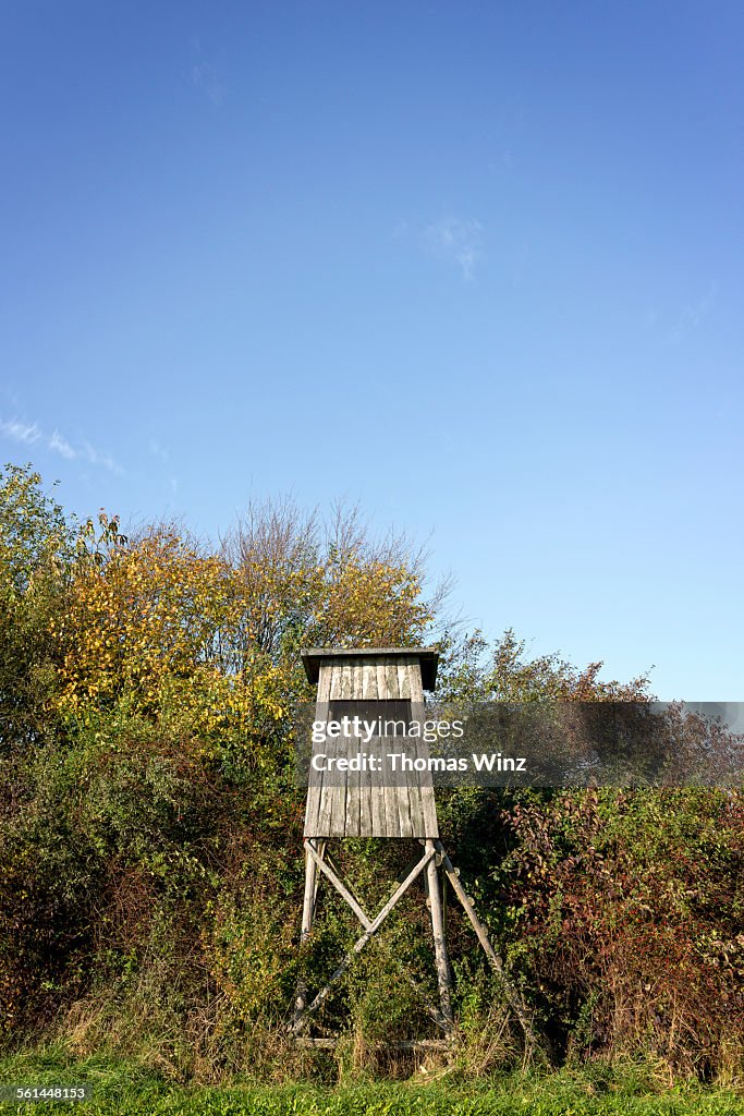 Hunting blind next to a field