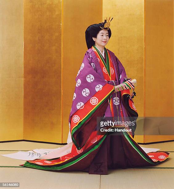 In this Handout Photo released by the Imperial Household Agency, Japan's Princess Sayako, wearing ancient Japanese formal court ensemble junihitoe ,...