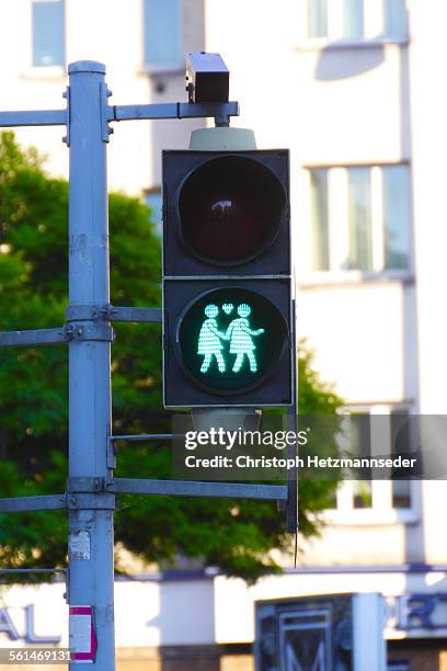 same-sex traffic lights - walk signal stock pictures, royalty-free photos & images