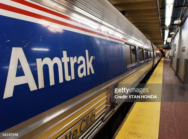New York, UNITED STATES: In this 25 October, 2002. File photo, an Amtrak train sits idle at Penn Station in New York. Amtrak, the struggling US...