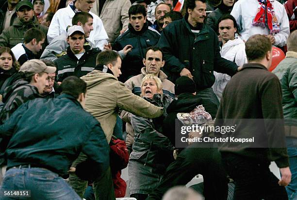 German fans clash with French fans during the international friendly match between France and Germany at the Stade de France on November 12, 2005 in...