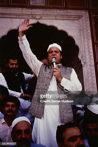 Nawaz Sharif, leader of the Islami Jamhoori Ittehad or Islamic Democratic Alliance , speaking at the Badshahi Mosque in Lahore, following his victory...