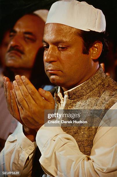 Nawaz Sharif, leader of the Islami Jamhoori Ittehad or Islamic Democratic Alliance , participates in friday prayer at the Badshahi Mosque in Lahore,...