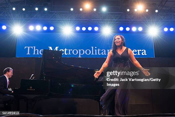 American soprano Janai Brugger performs an aria during the seventh annual, season-opening concert in the Metropolitan Opera Summer Recital Series at...