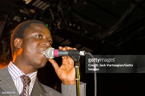 Senegalese Mbalax musician Thione Seck and his band Raam Daan perform onstage at Irving Plaza, New York, New York, Friday, February 14, 2003.